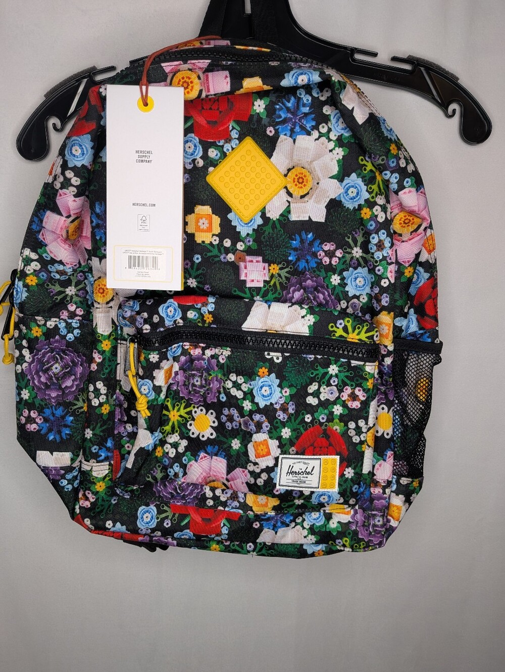 The Herschel Supply Co. x LEGO Heritage Backpack in Garden Floral feature NWT